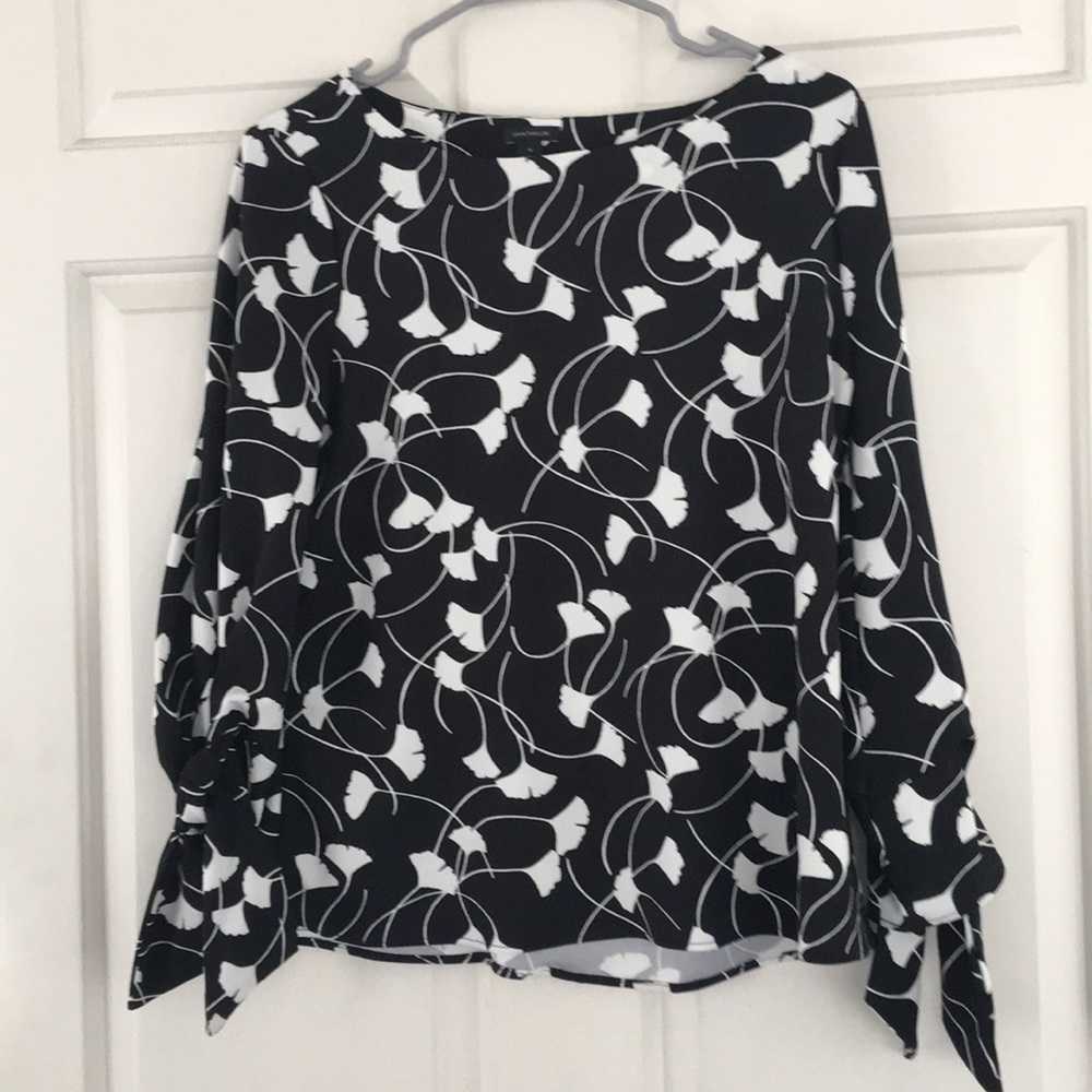 Ann Taylor black top with ginkgo print.